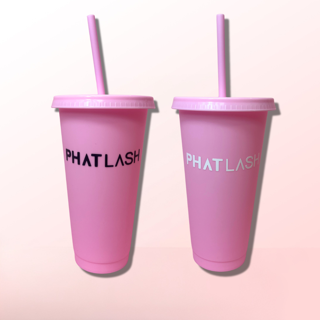 Two pink tumblers with 'PHAT LASH' branding on a pink background