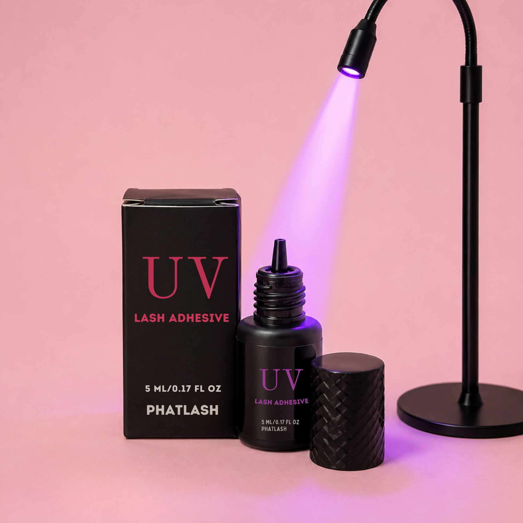 UV Lash Glue for Lash Techs with LED lamp on pink background