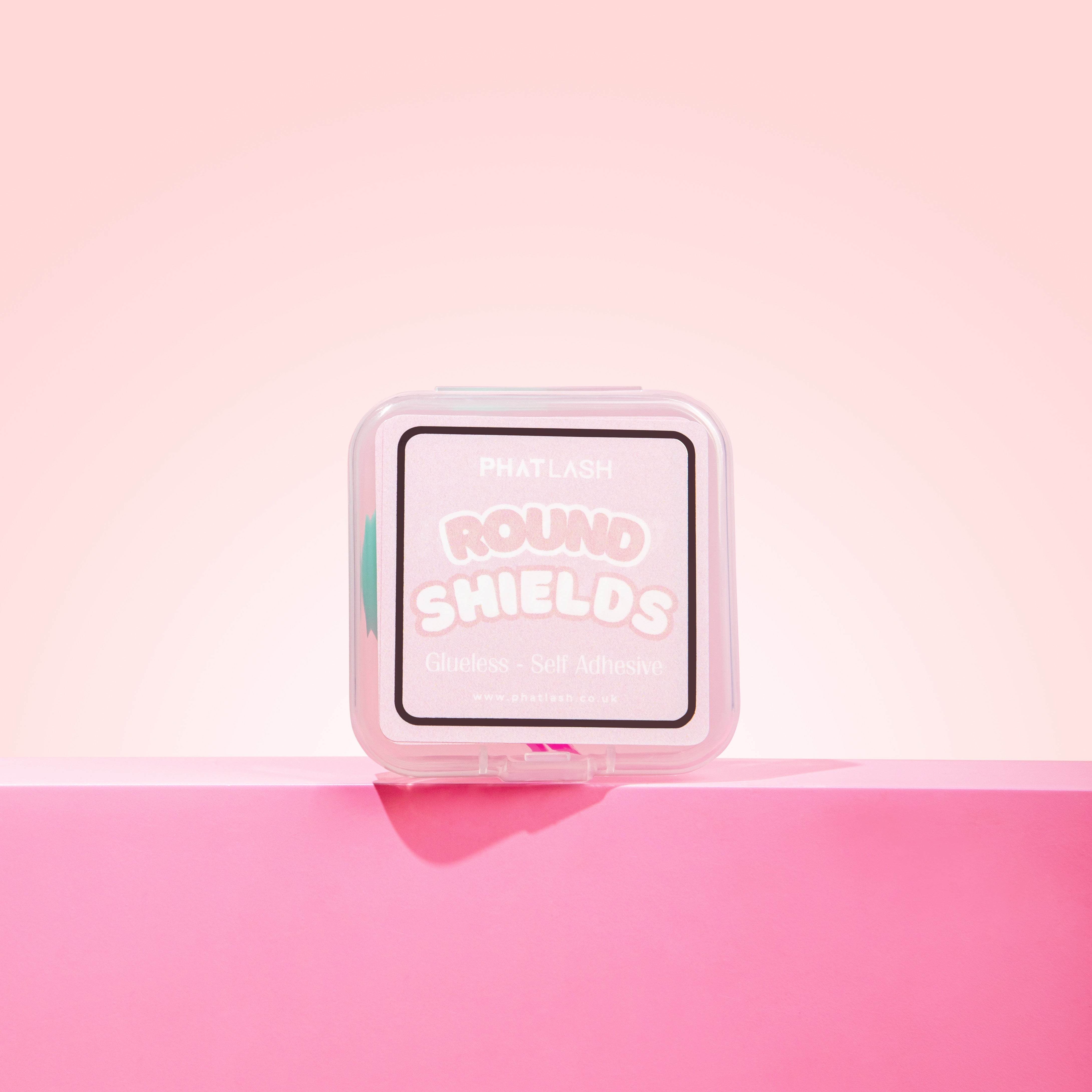 Round Shields product on a pink background