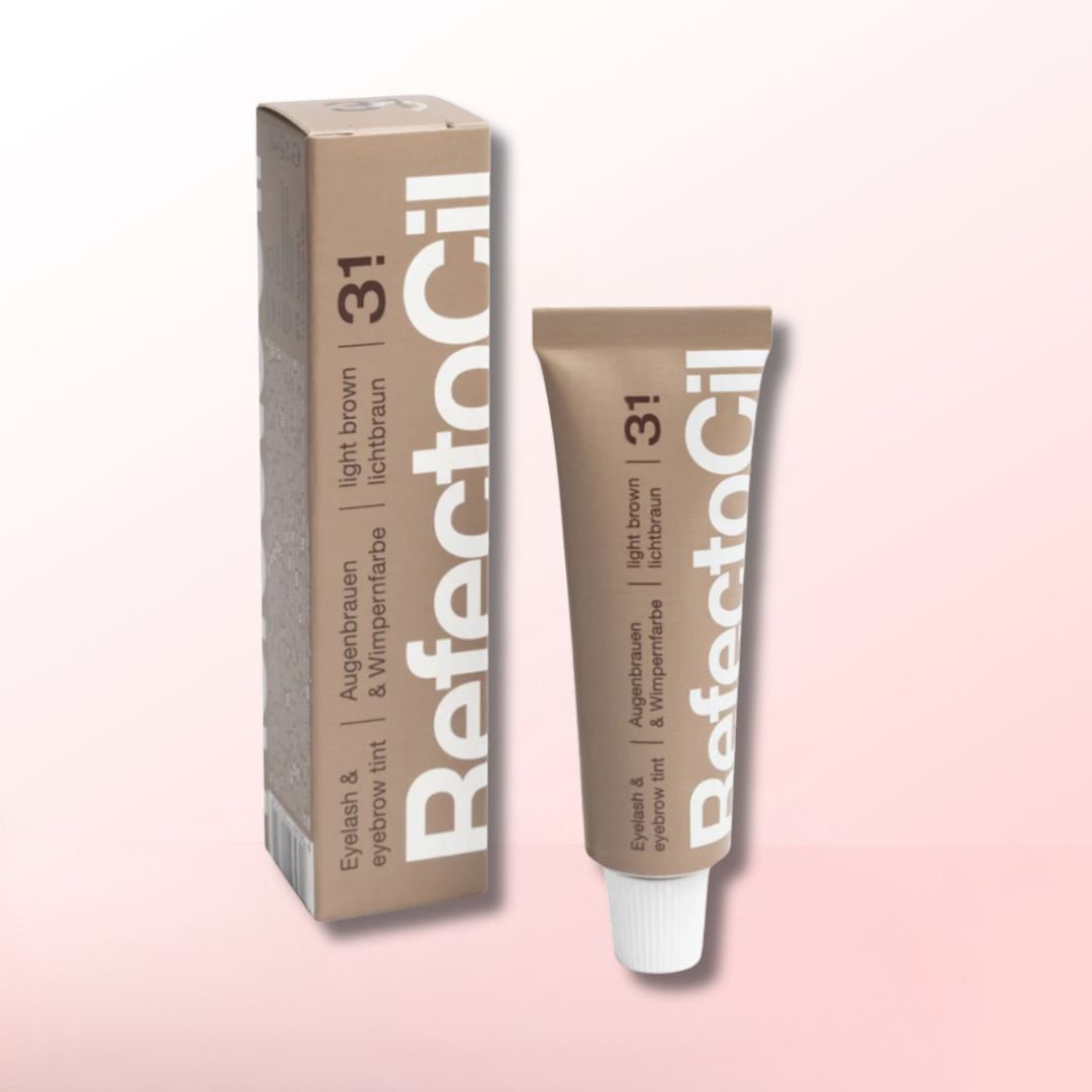 Refectocil eyelash and eyebrow tint packaging on a pink background