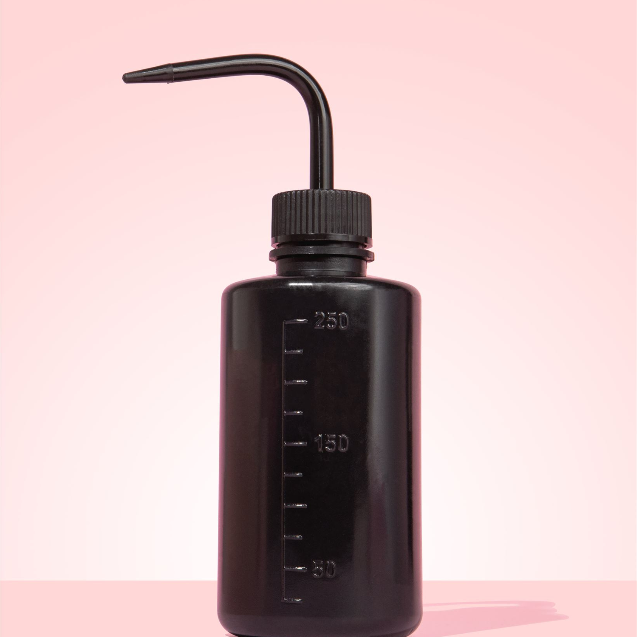 black lash rinsing bottle